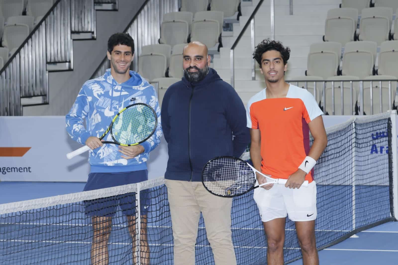 Aziz Dougaz and Abdallah Shelbayeh with the chair umpire<br>