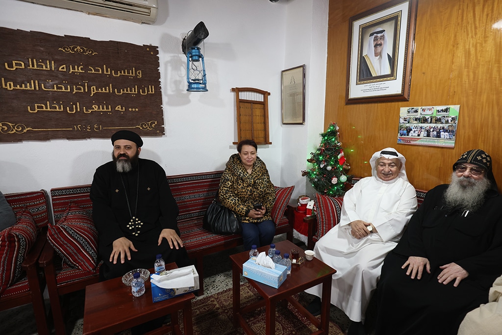 Kuwaiti pastor Emmanuel Ghareeb and priests pose for a photo as Christians celebrate Christmas in Kuwait City.