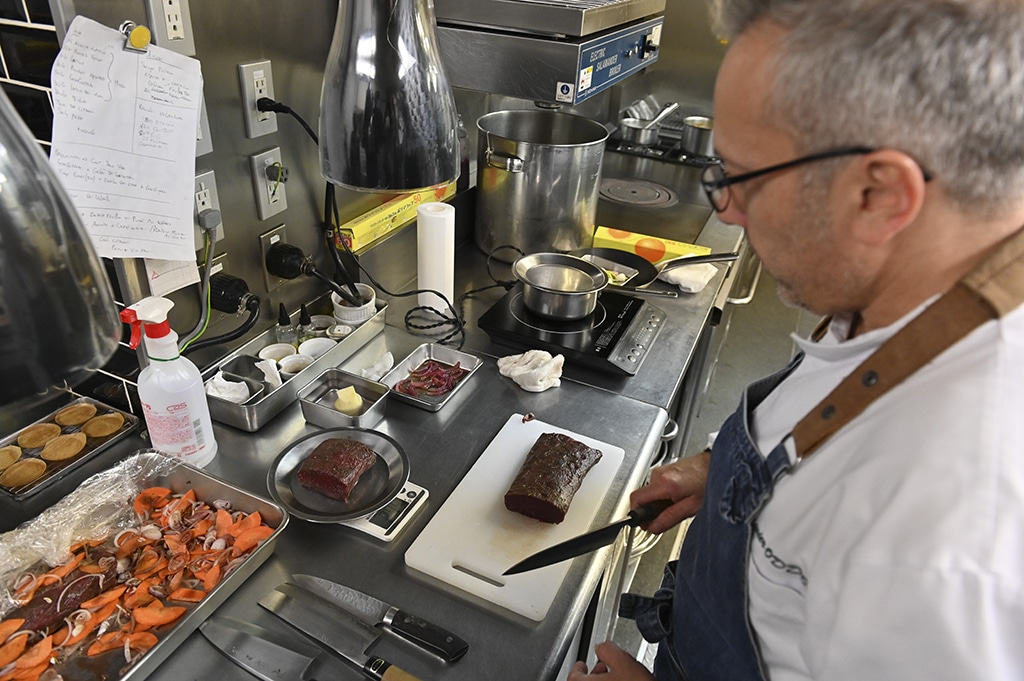  French chef Olivier Oddos, whose Tokyo restaurant boasted a Michelin star between 2014 and 2021, preparing food at his restaurant's kitchen in Tokyo. 