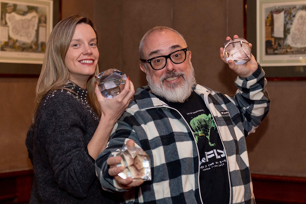 Spanish producer Alex de la Iglesia (right) and his wife, Spanish actor and producer Carolina Bang (left), pose with the Grand Prize award and Great East Region - Youth Jury trophies they received on behalf of Spanish actor and director Eduardo Casanova for
