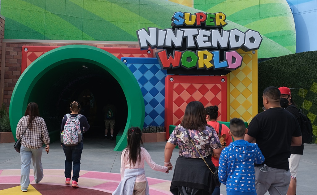 Guests walk towards the entrance during a preview of Super Nintendo World at Universal Studios.