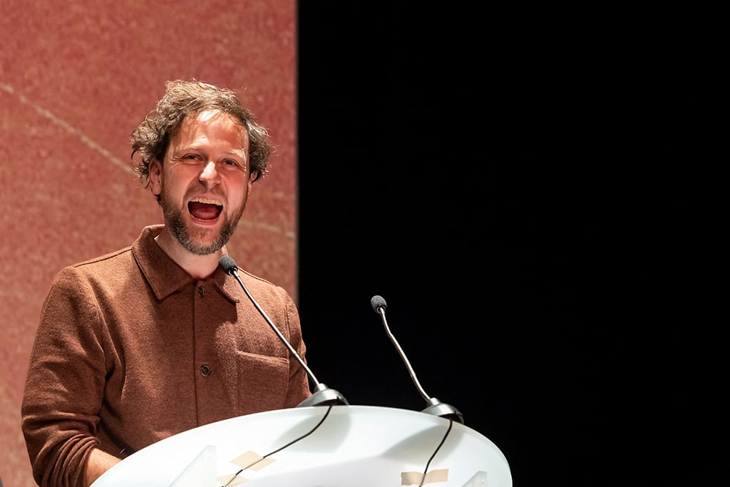 Member of the feature film jury French actor Pierre Rochefort announces the winner of the Jury Prize award.