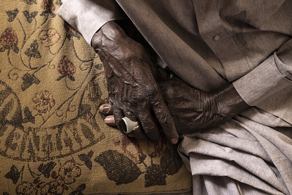 The hands of Diogo Dieye 103, a former Senegalese tirailleur, who fought for the French during World War II, in Lebanon and in Libreville, are seen in Thies. 