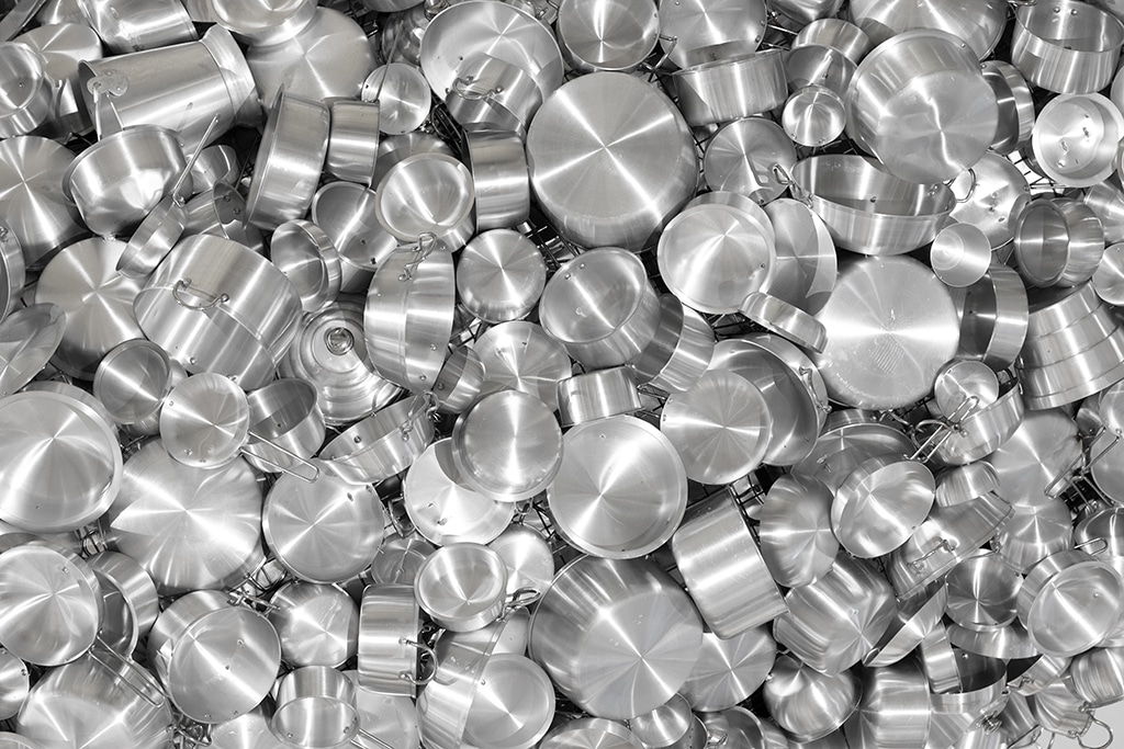 A photograph shows part of an installation by Indian artist Subodh Gupta made with kitchen ustensils collected from markets during his exhibition entitled