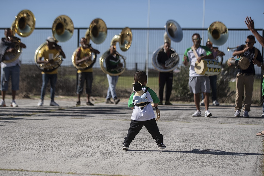 A young members of the Playaz Inc minstrel troupe dances as they practice at a school in Mitchells Plain near Cape Town.
