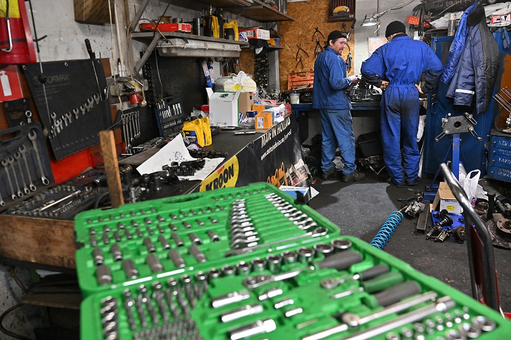 Mechanics work in a auto repairing shop in Ukrainian capital of Kyiv.
