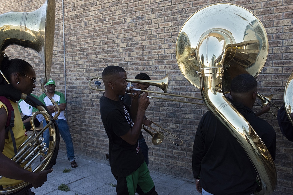 A member of the Playaz Inc minstrel troupe gets ready to play his tuba as they practice at a school in Mitchells Plain near Cape Town.