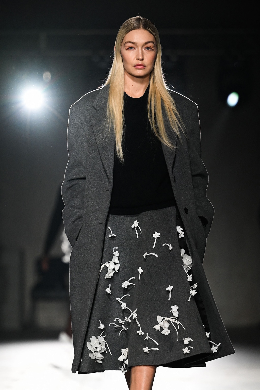 US model Gigi Hadid presents a creation for Prada