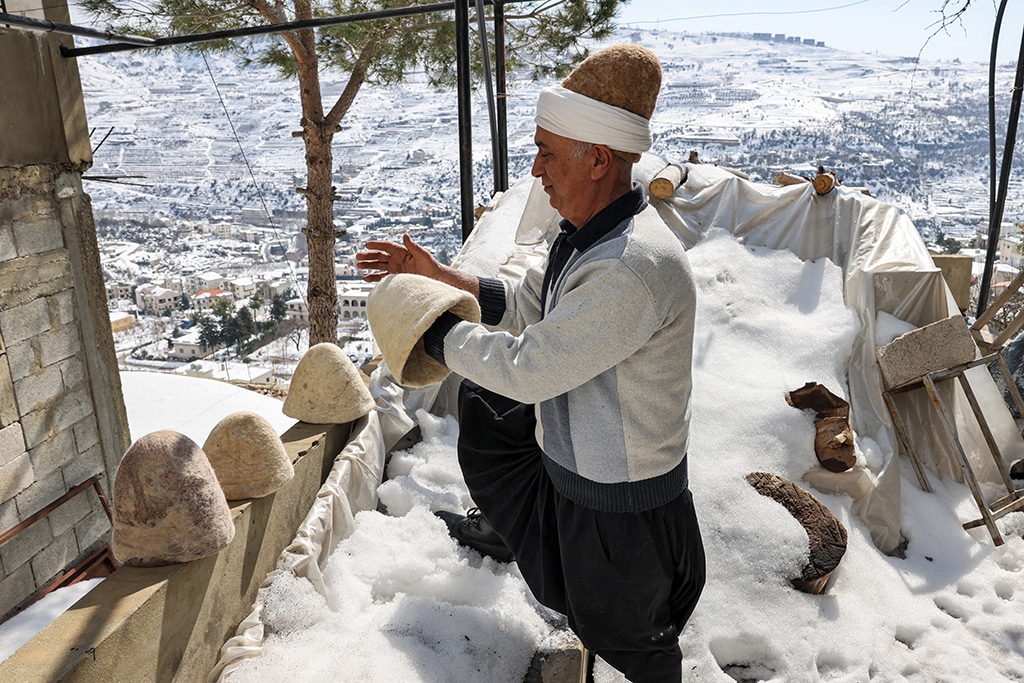 Hatmaker Youssef Akiki leaves his recently-finished Lebanese wool hats known as 