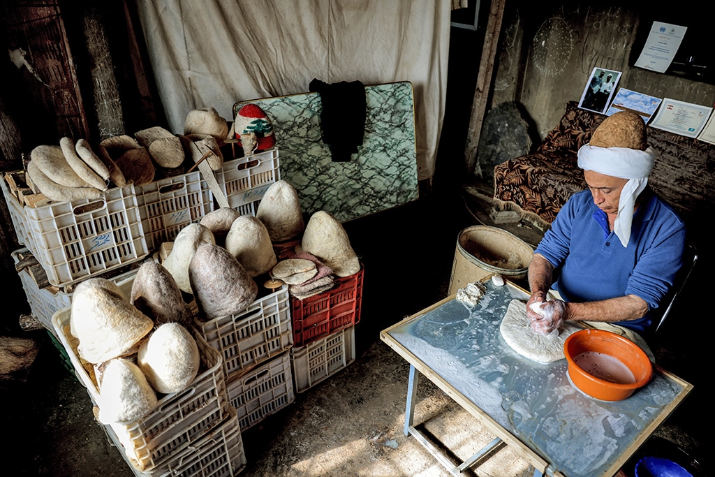 Hatmaker Youssef Akiki shapes one of his traditional 