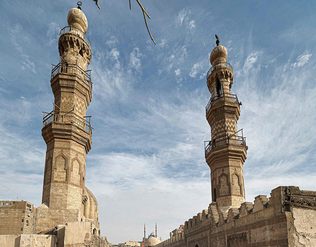 Cars drive near the Mosque and Khanqah of Shaykhu in Cairo's Al-Khalifa district on Jan 11, 2023.