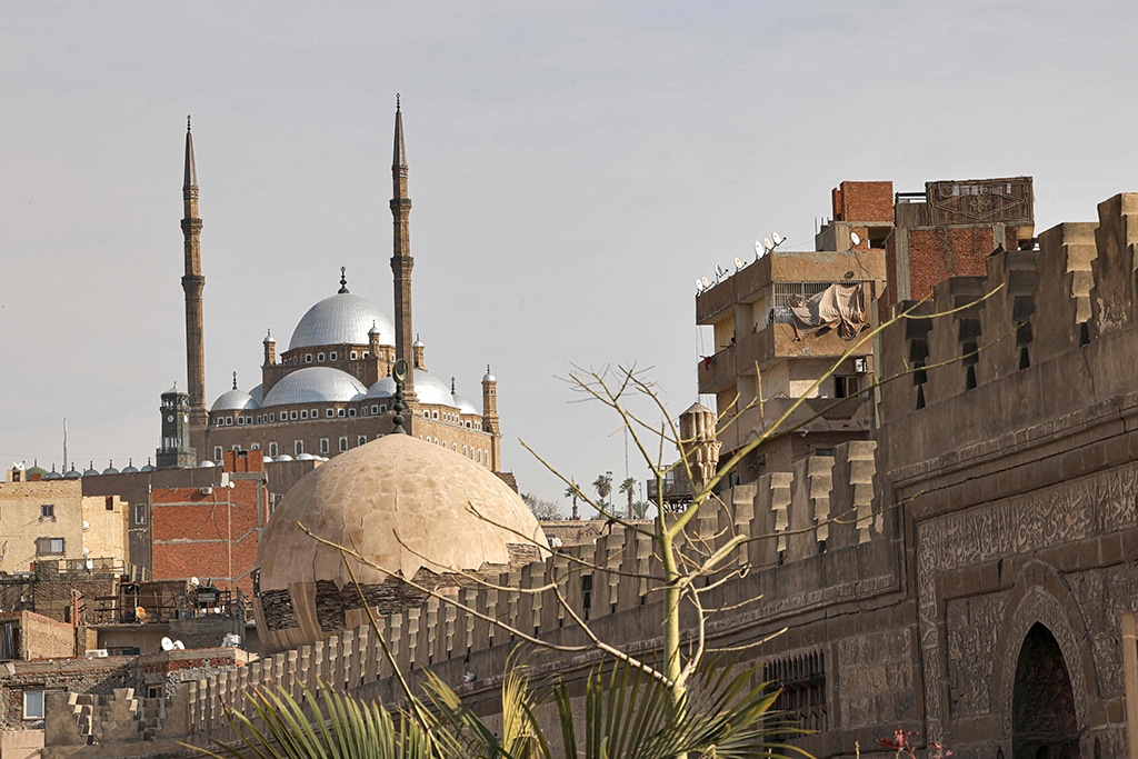 The Mohammed Ali Mosque (above) is seen inside the Salaheddine Citadel behind part of Shaykhu Mosque (below) in Cairo's Al-Khalifa district.
