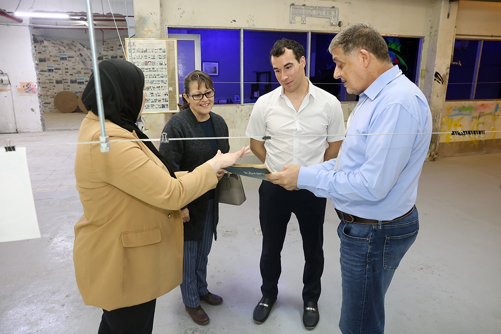 KUWAIT: Kuwait Times team shows the delegation a special copy of Kuwait Times newspaper that was published on its 61st anniversary.