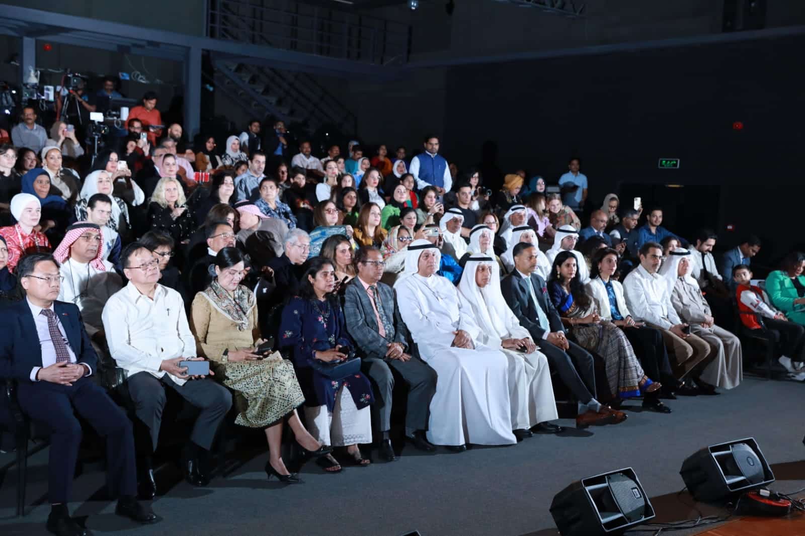 Audience are seen during the event.