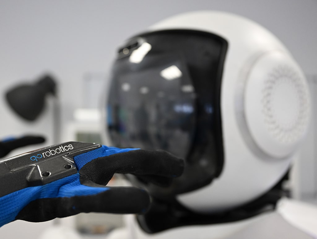 The artificial hand of the Garmi robot is seen in front of the robot.