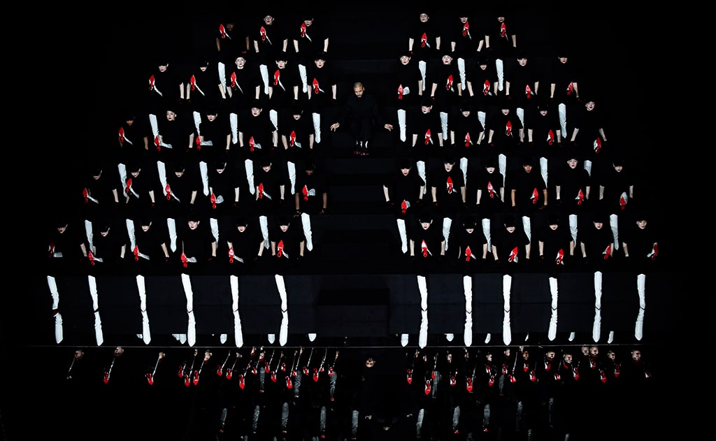 Dancers, wearing Louboutin shoes, perform to celebrate the 30th anniversary of the red sole (semelle rouge) on the sidelines of the Paris Fashion Week. 