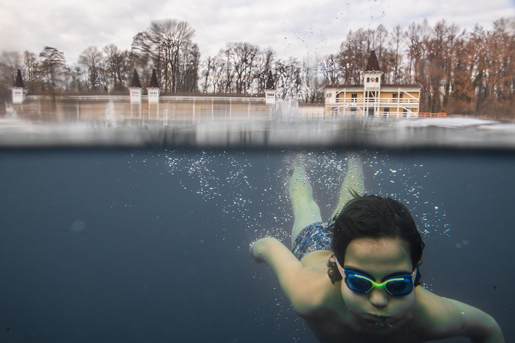 A child swims in the lake of Heviz, the world's largest biologically active naturally thermal lake.