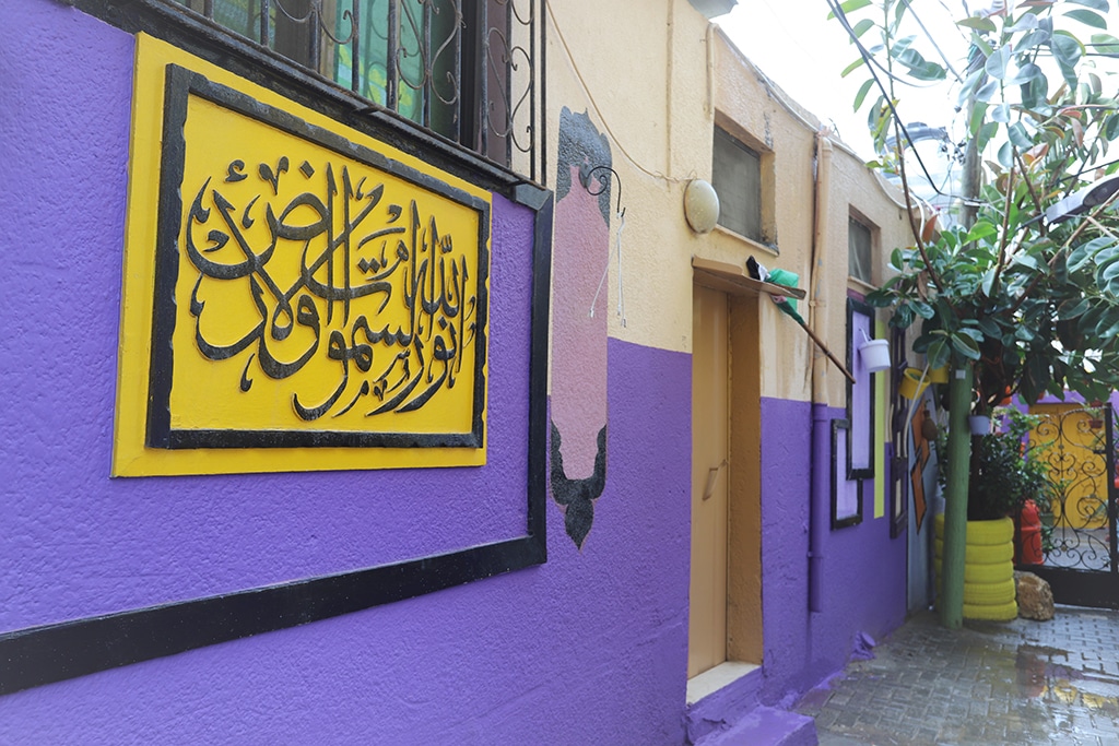 Palestinians turn neighborhood walls into colorful Ramadan theme murals