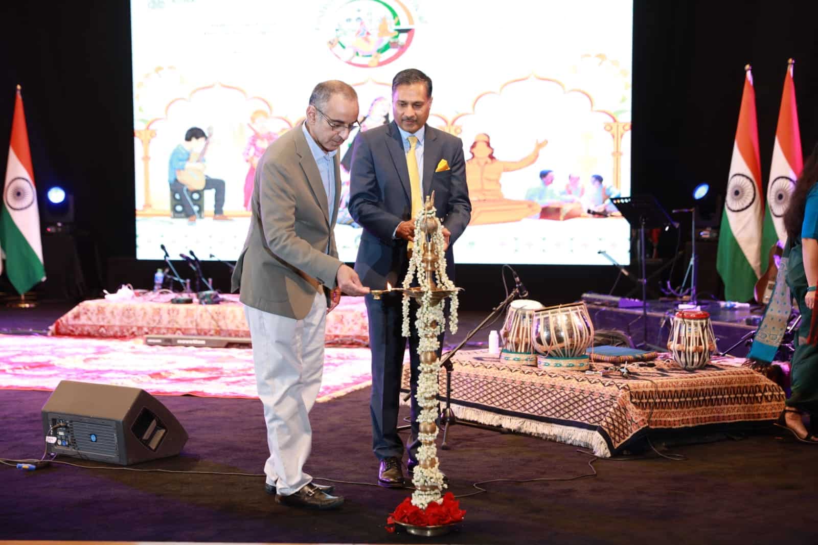 Indian Ambassador to Kuwait Dr Adarsh Swaika lighting the lamp to inaugurate the event.