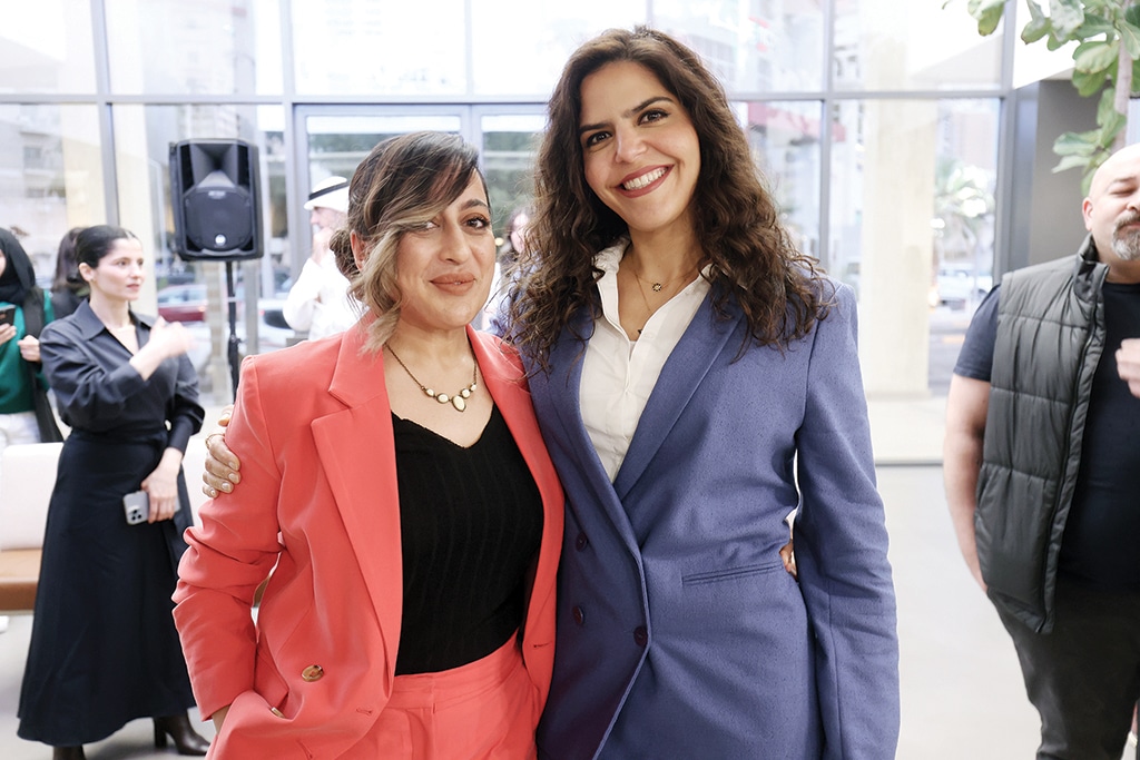 Sadie Hussain, General Counsel at BNKH (left) and Chief Support Services Officer Aseel Al-Turkait take a photo.