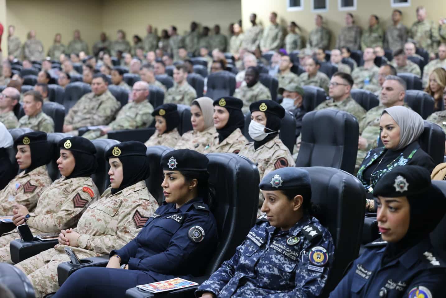 Female officials from Kuwaiti Ministry of Defense and Interior attending the event. 