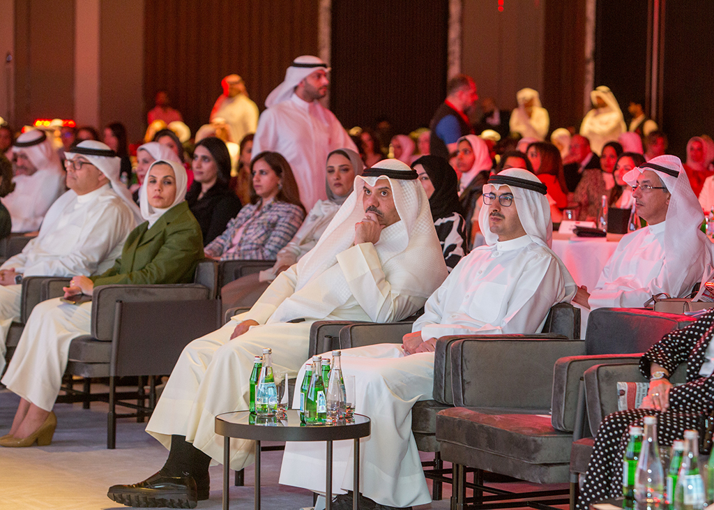 Minister of Social Affairs and Women and Children’s Affairs Mai Al-Baghl (third left),  Jassim Mustafa Boodai (second left) and Sheikh Ahmed Al-Duaij (right) lead the audience.