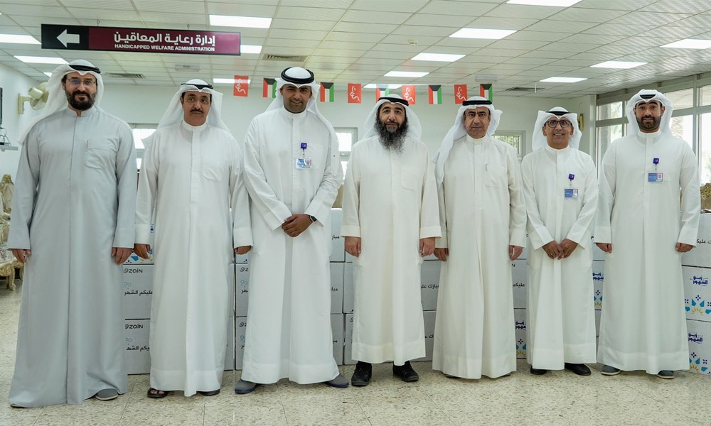 Zain and Social Care Centers officials.