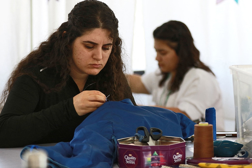 Iraqis in asylum limbo in Jordan fashion their future