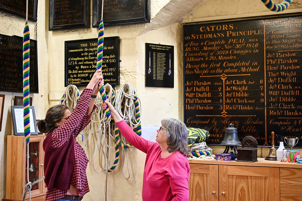Kate Flavell (right) teaches Anne Porter (left) during a bell ringing training session at All Saints Church, Kingston-upon-Thames, in southwest London.