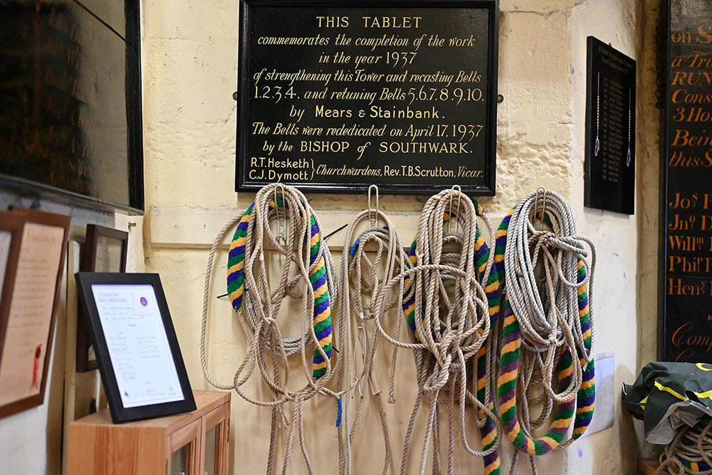 A photograph shows ropes hanging on the wall during a bell ringing training session at All Saints Church, in Kingston-upon-Thames in southwest London.