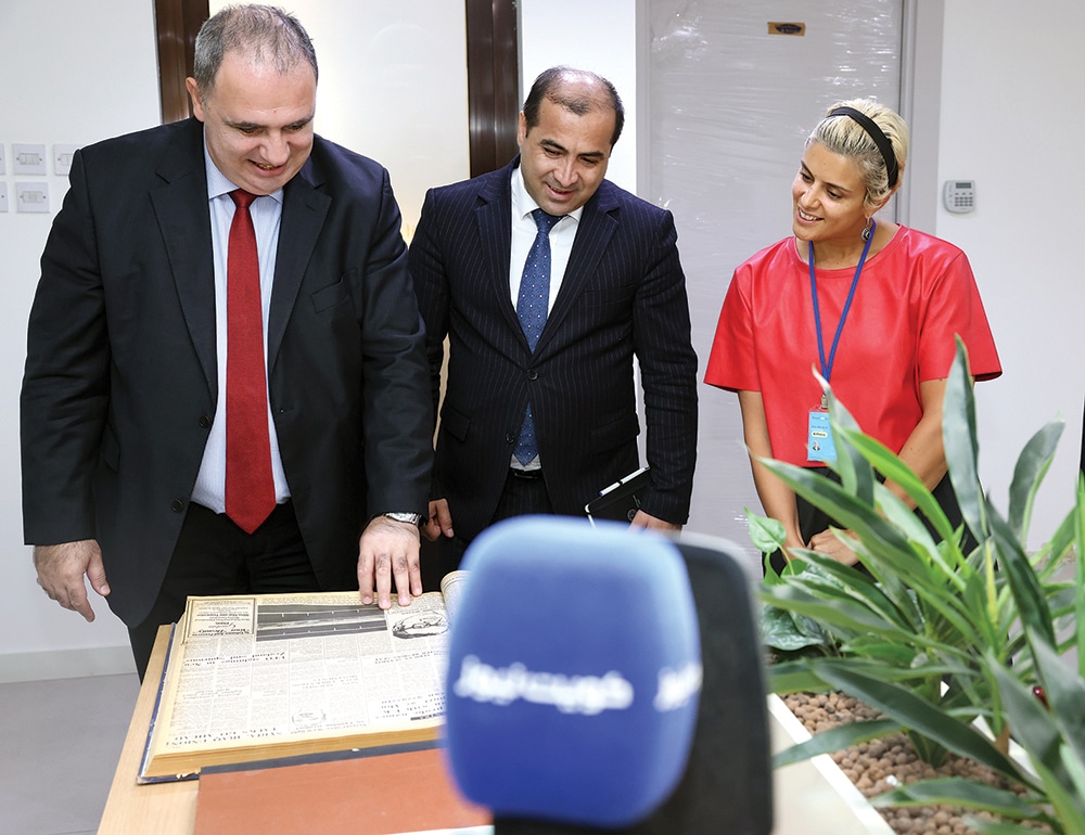 (From left) Ambassador Emil Karimov, Consul Merdawood Sultanov and Jana Al-Naqeeb view Kuwait Times’ archives.