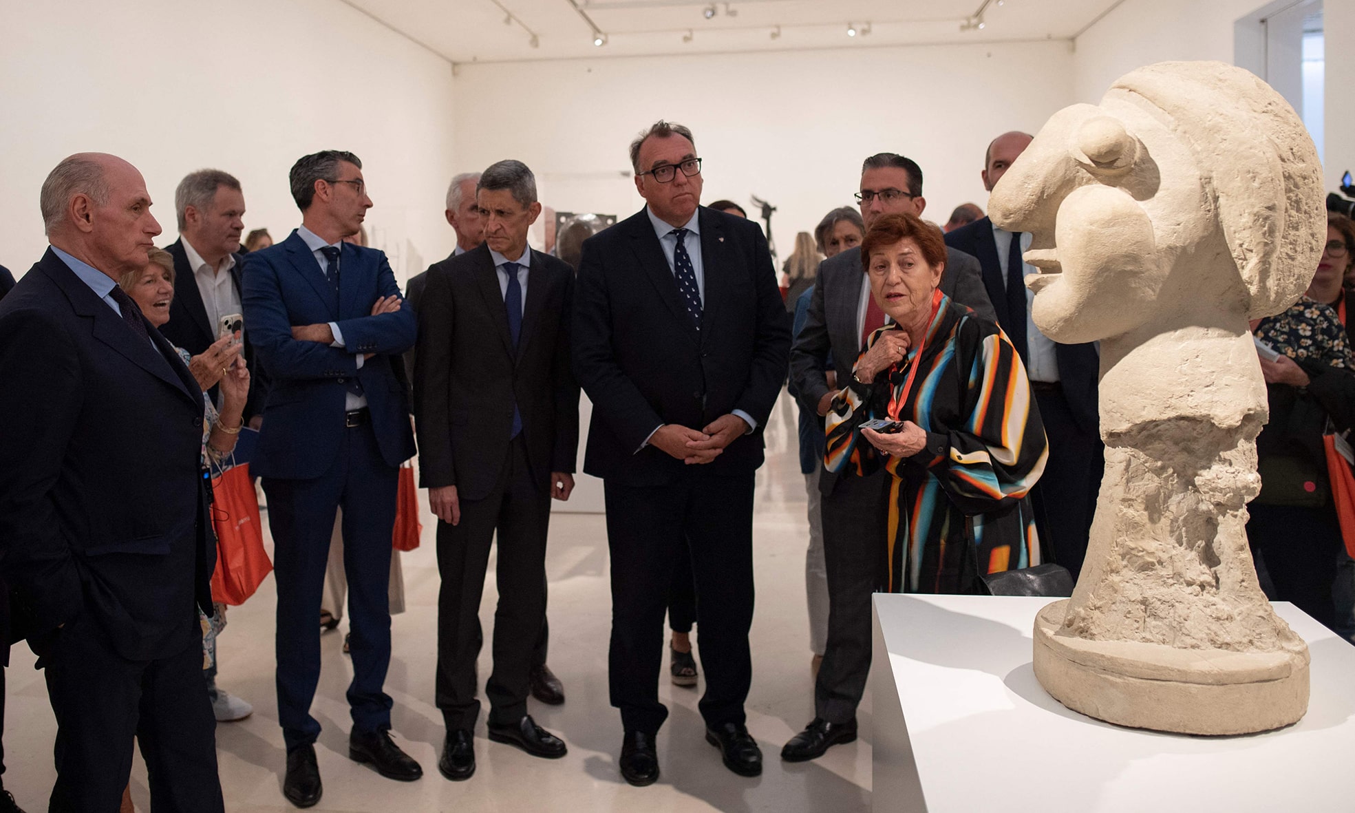 Grand-son of Pablo Picasso, Bernard Ruiz-Picasso (left) and Art Curator Carmen Gimenez, pose during the inauguration of the “Picasso Escultor.