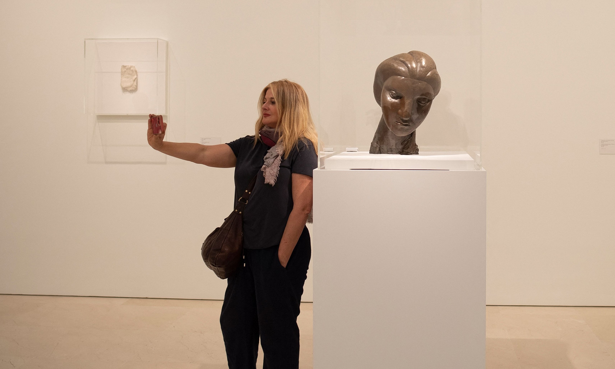 A visitor attends the inauguration of Spanish painter and sculptor Pablo Picasso's “Picasso Escultor.
