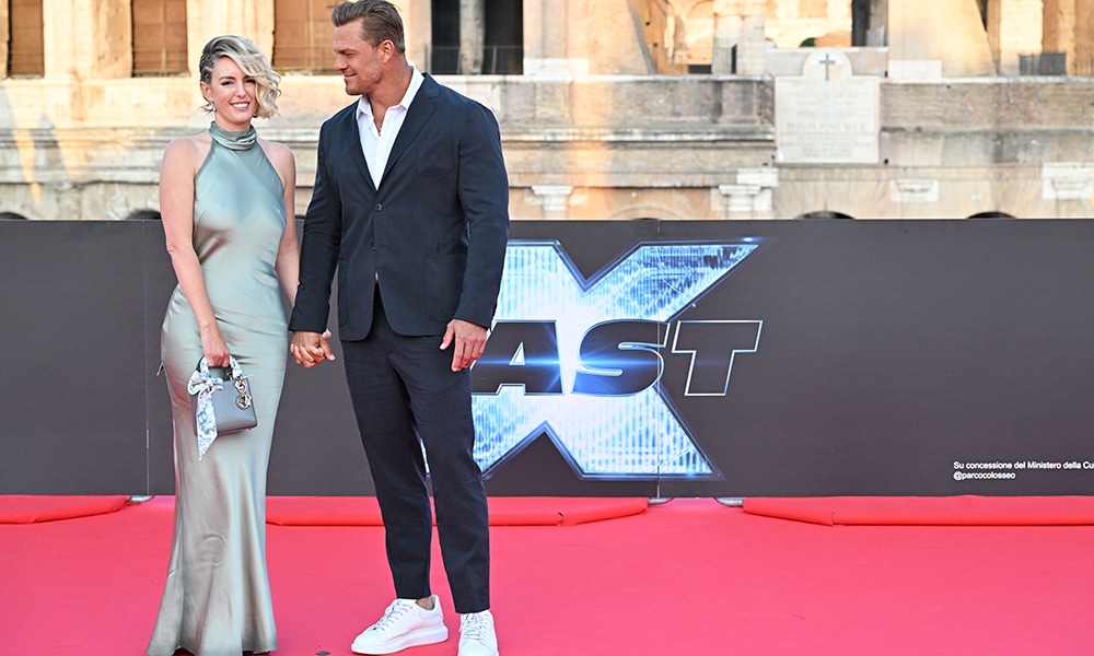 US actor and singer Alan Ritchson and his wife Catherine Ritchson arrive for the Premiere of the film 'Fast X'.