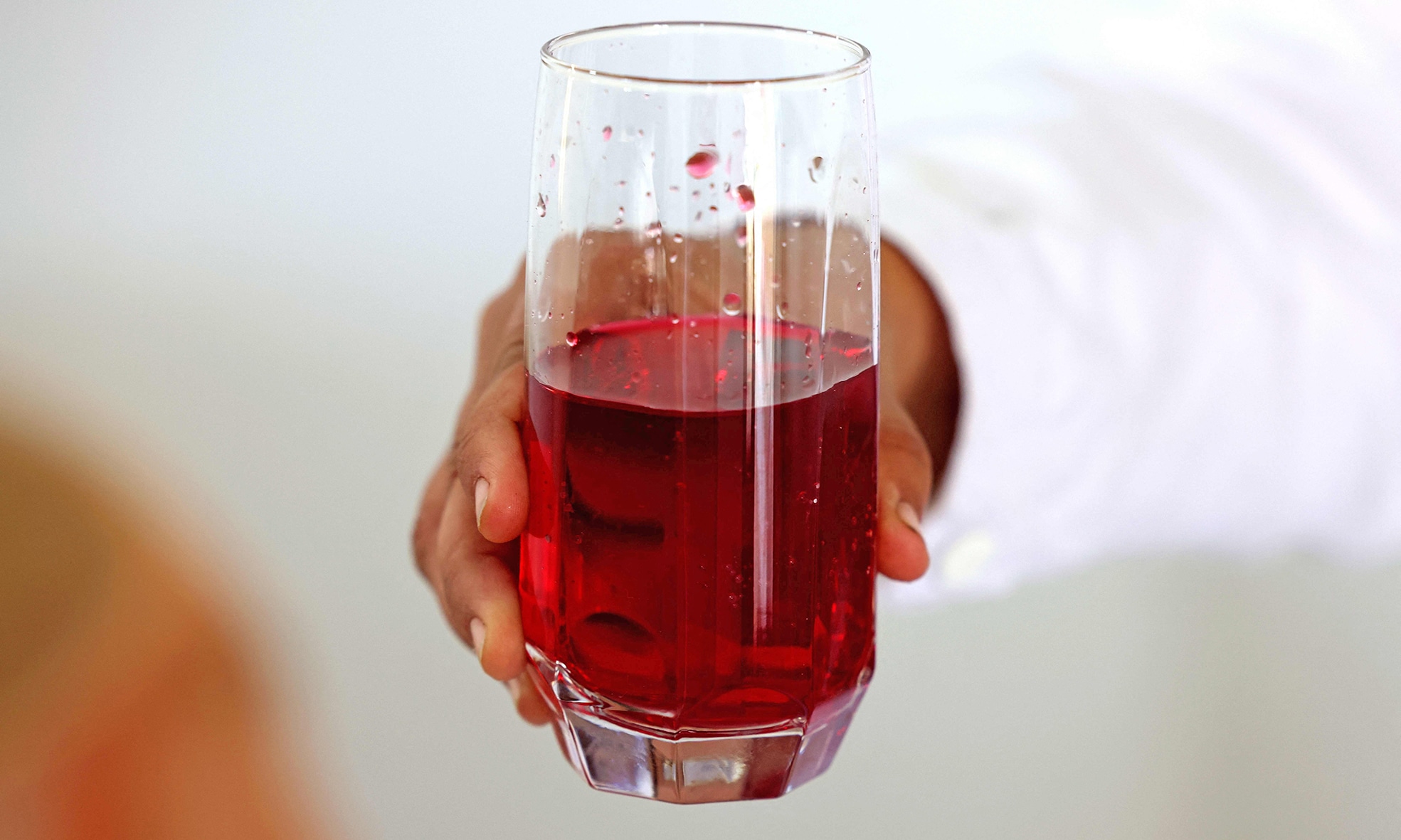 Zahraa Sayed Ahmed produces a syrup from Damascena (Damask) roses, at her house in the village of Qsarnaba.