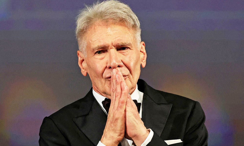 US actor Harrison Ford thanks the audience before being awarded with an Honourary Palme d'or prior to the screening of the film 'Indiana Jones and the Dial of Destiny'.