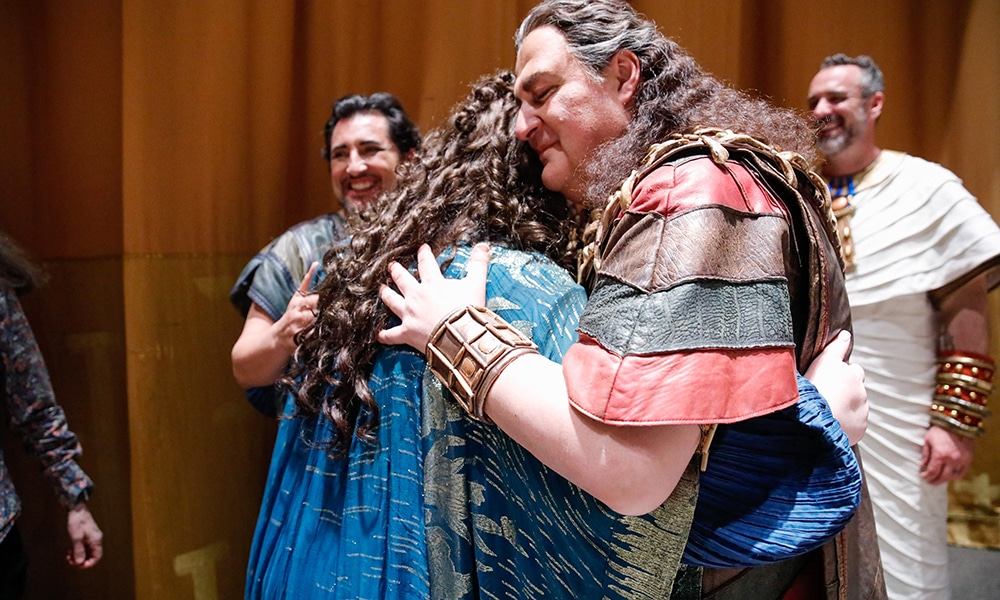 Opera singers Leah Crocetto and George Gagnidze hug after the final performance of Giuseppe Verdi's 'Aida' at the Metropolitan Opera House in Lincoln Center.