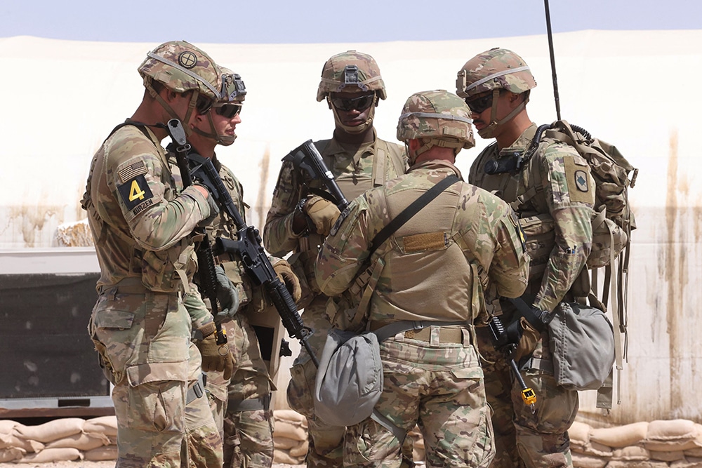 US military personnel participate in the Best Squad Competition at the Buehring base camp in Udairi, in the northwestern region of Kuwait, on May 10, 2023. (Photo by Yasser Al-Zayyat / AFP)