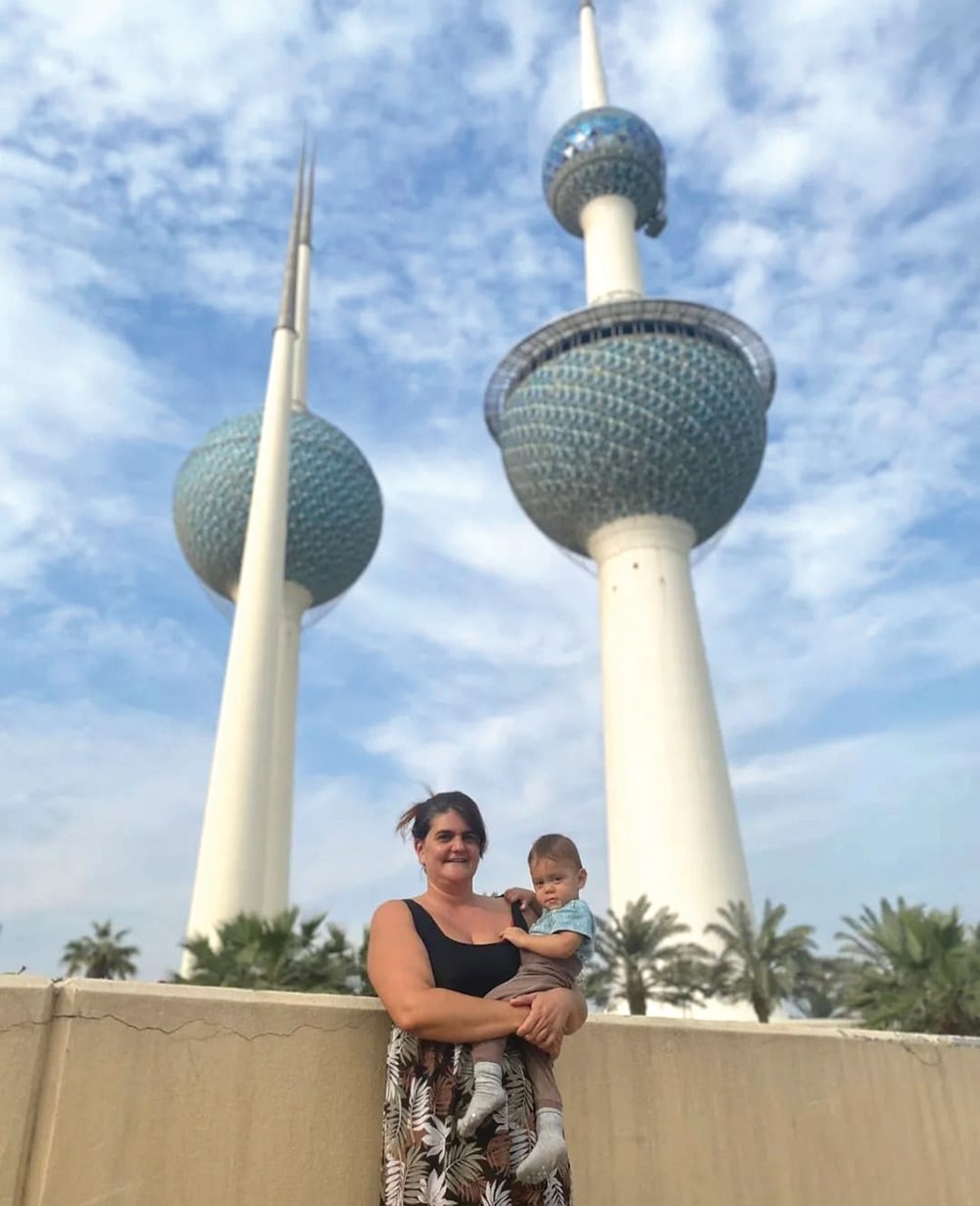 Andrea and Raphael pose for a photo in front of Kuwait Towers during their visit to Kuwait.