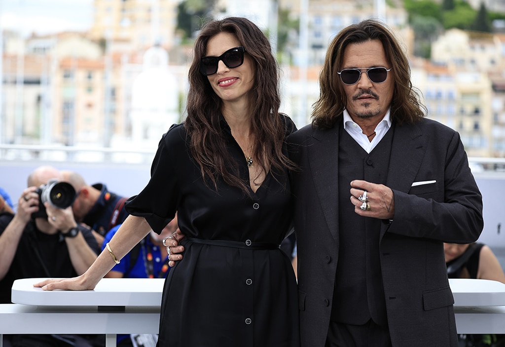 French actress and director Maiwenn (left) poses with US actor Johnny Depp during a photocall for the film 'Jeanne Du Barry' during the 76th edition of the Cannes Film Festival in Cannes, southern France.