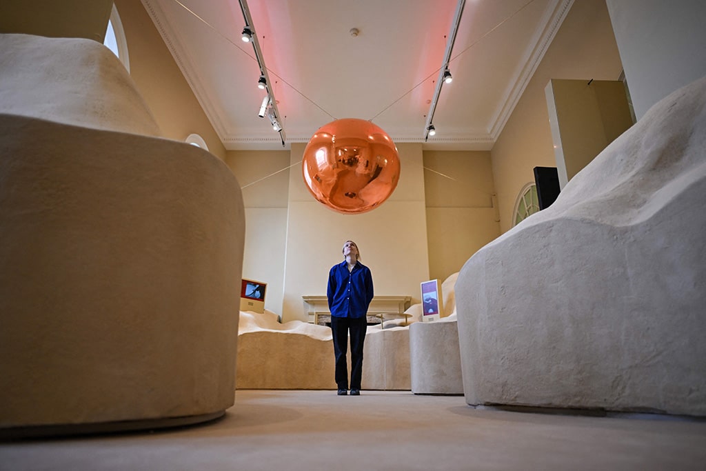 A visitor looks at the Dubai installation during the press preview of the London Design Biennale 2023 at Somerset House, central London.