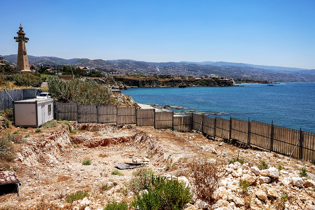 This picture shows a view of a fenced-off area for new developments under construction near a sea cave believed to be inhabited by seals off Lebanon's northern village of Amchit.