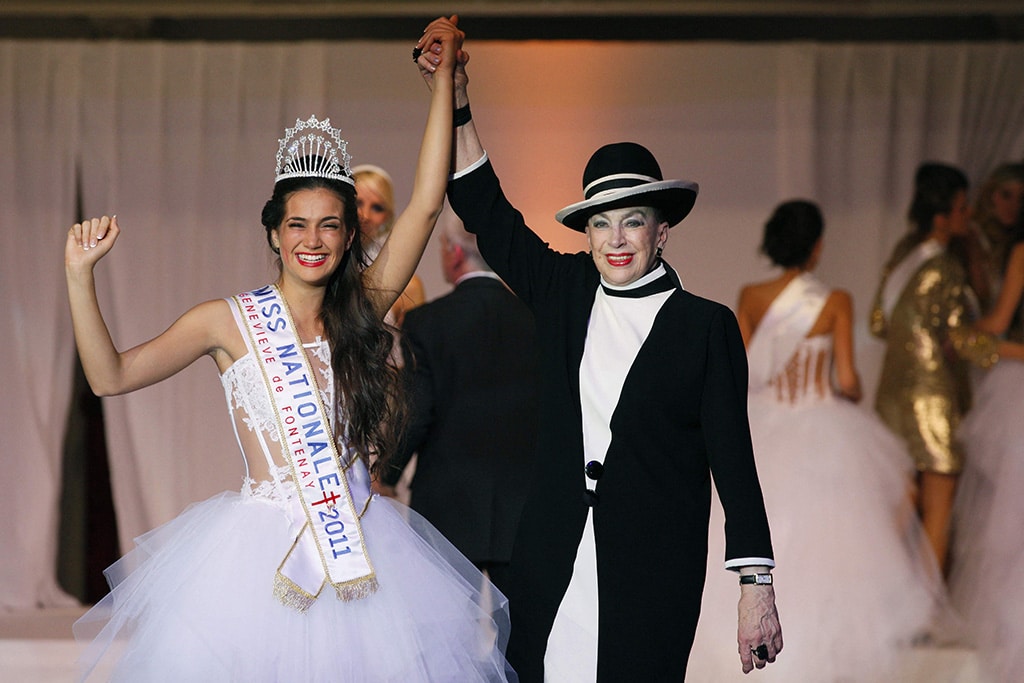 Miss Provence Barbara Morel (left), reacts after being crowned Miss Nationale 2011 beauty contest of the 'Genevieve de Fontenay national committee', next to Genevieve de Fontenay (right), on December 5, 2010 in Paris.